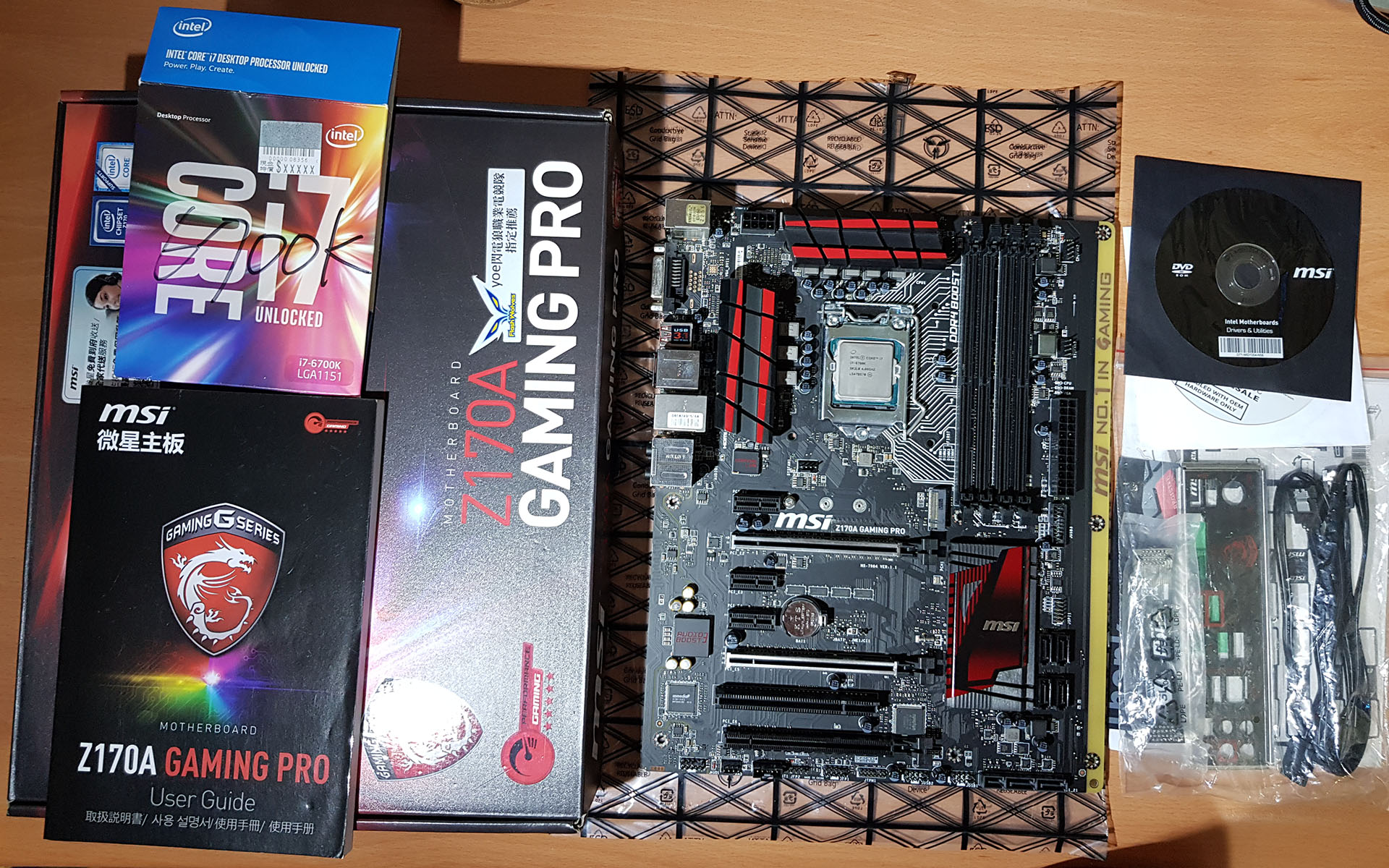 Mobo cpu and parts.jpg Mobo cpu and parts.jpg