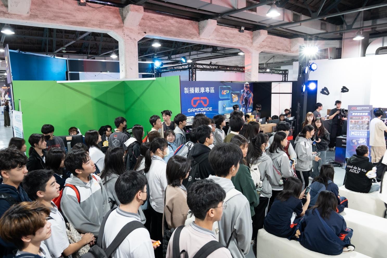 A group of people in a roomAI-generated content may be incorrect.