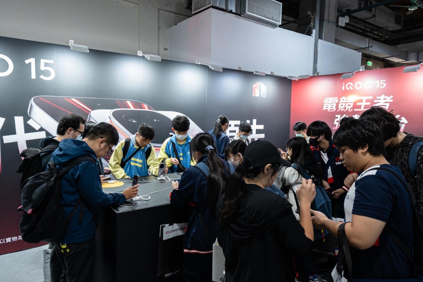 A group of people standing around a counterAI-generated content may be incorrect.